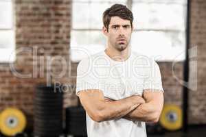 Portrait of muscular man looking at camera