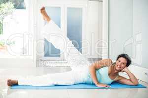 Pregnant woman keeping in shape at home