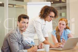 Businessman with female colleagues in meeting