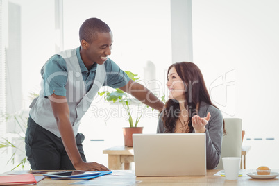 Happy Business people using laptop at desk