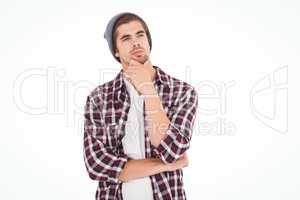 Thoughtful hipster against white background