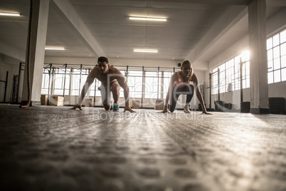 Two fit people doing fitness