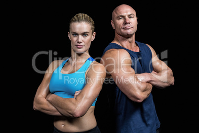 Portrait of confident strong man and woman
