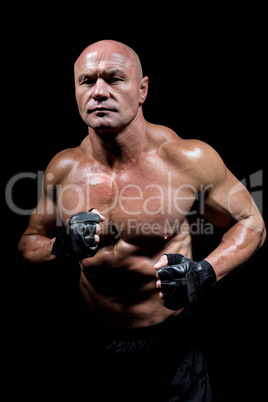 Portrait of confident man with fighter stance