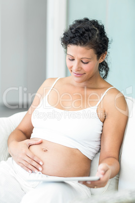 Happy woman with tablet pc