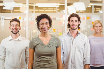 Portrait of smiling colleagues in office