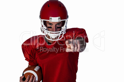 Portrait serious rugby player pointing finger