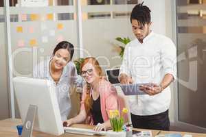 Business people using technologies in office