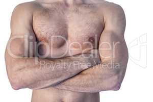 Midsection of a man with arms crossed