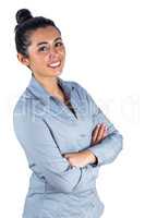 Happy woman looking at the camera with folded arms