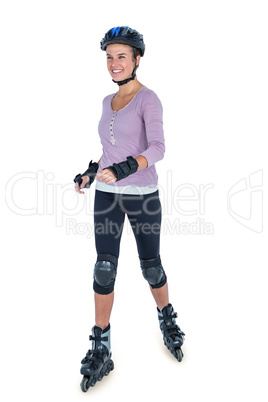 Young woman inline skating