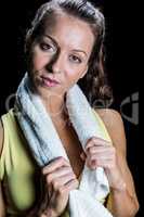 Portrait of pretty athlete with towel around neck