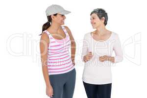 Happy fit women discussing