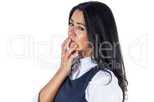 Woman deep in thought with hand on her chin