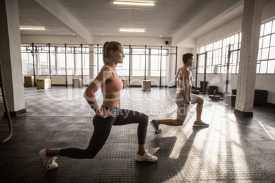 Two fit people doing fitness