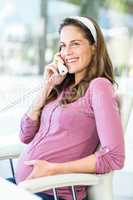 Happy businesswoman on phone call
