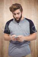 Hipster using cellphone