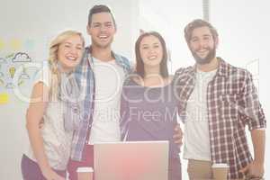 Portrait of smiling business people standing with arm around