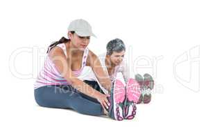 Women stretching while exercising