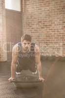 Man doing bosu push ups