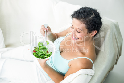 High angle view of woman with salad