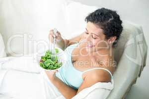 High angle view of woman with salad