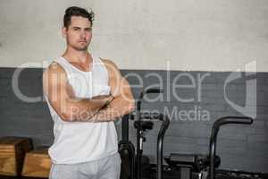 Portrait of handsome man with arms crossed