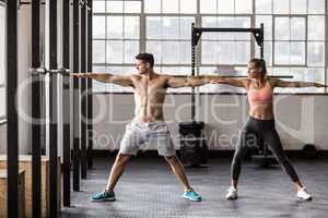 Two fit people doing fitness