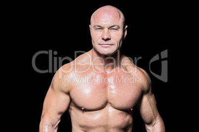 Portrait of confident muscular man