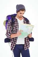 Man with backpack looking in map