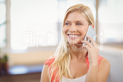 Beautiful businesswoman talking on phone