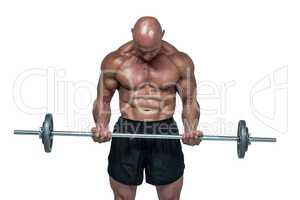 Muscular man lifting crossfi