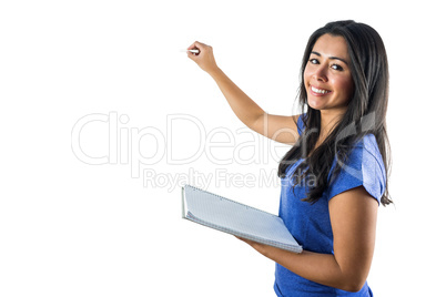 Smiling woman about to write something