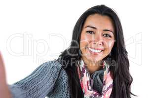 Smiling woman about to take a selfie