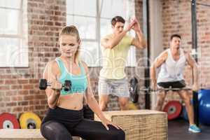 Fit people working out in gym