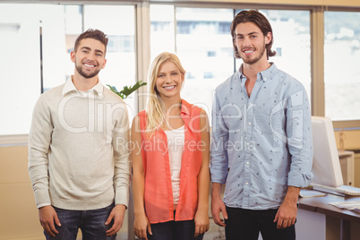 Portrait of smiling business people in meeting room