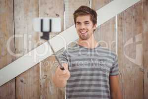 Happy man taking selfie