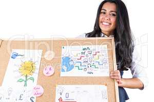 Smiling woman holding a noticeboard