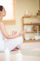 Side view of woman meditating