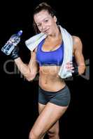 Portrait of smiling beautiful woman with water bottle