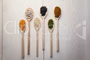 Wooden spoons of pulses and seeds