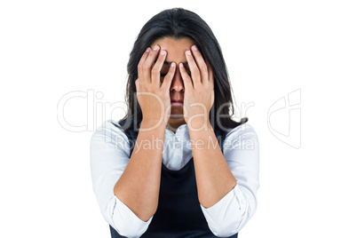 Upset woman with hands over her eyes