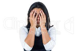 Upset woman with hands over her eyes
