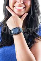 Cute woman wearing her smartwatch