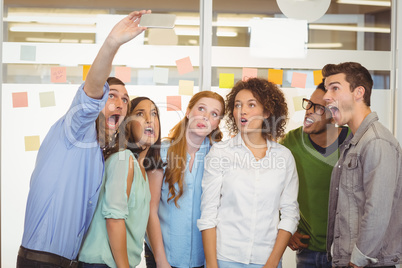 Business people taking selfie Business people taking selfie