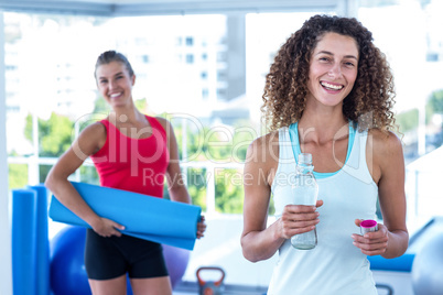 Portrait of cheerful women in fitness studio