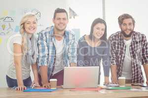 Portrait of smiling business people while standing