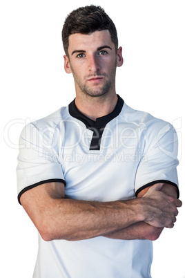 Portrait of rugby player with arms crossed