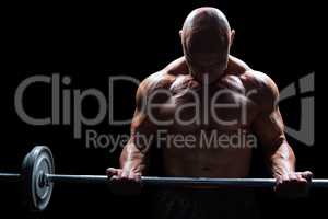 Muscular man lifting crossfit