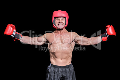 Winner boxer with arms outstretched